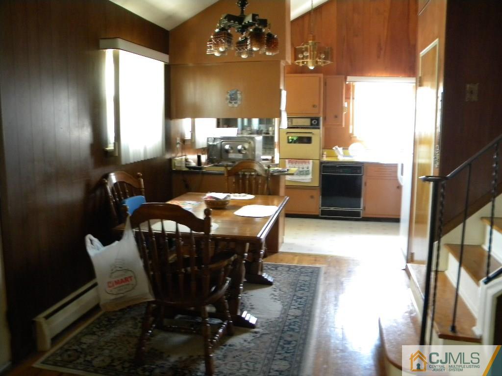 69 Eardley Road Edison, NJ 08817 - Photo 6 of 13 a dining room with furniture and window
