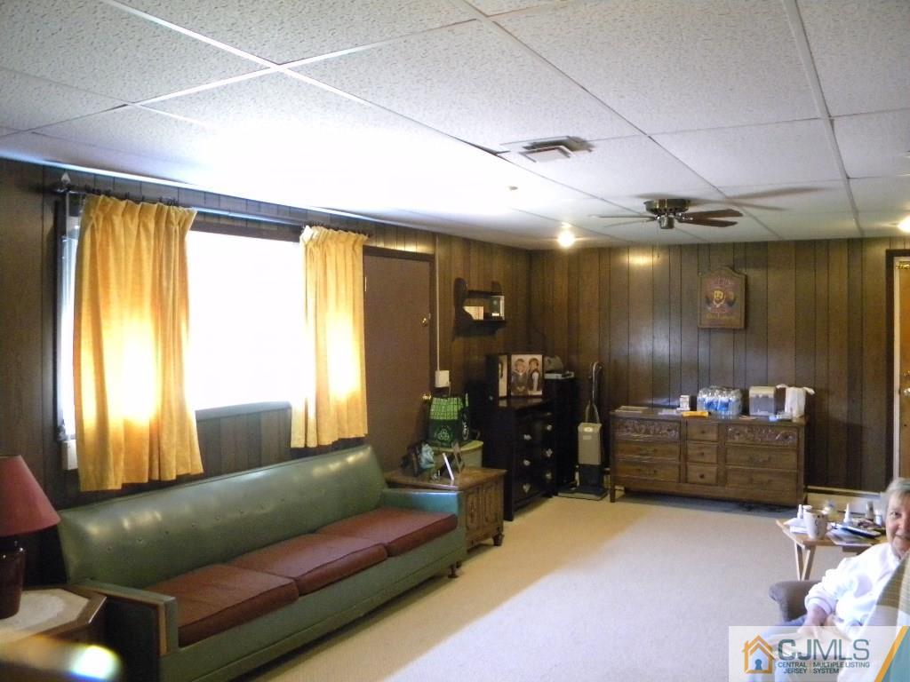 69 Eardley Road Edison, NJ 08817 - Photo 10 of 13 a living room with furniture and a window