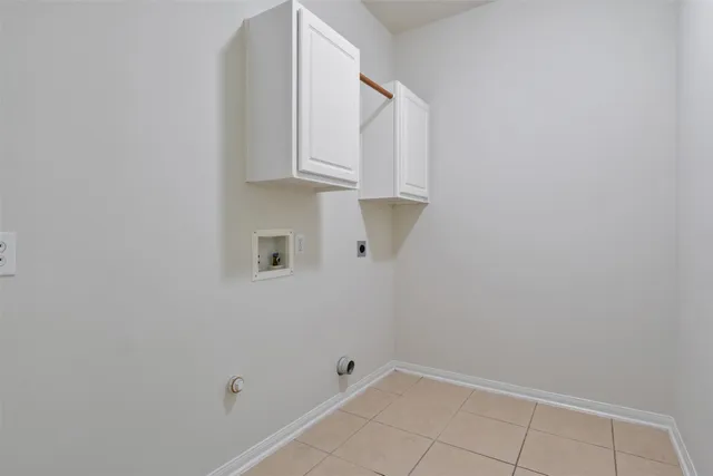 a view of cabinets and window