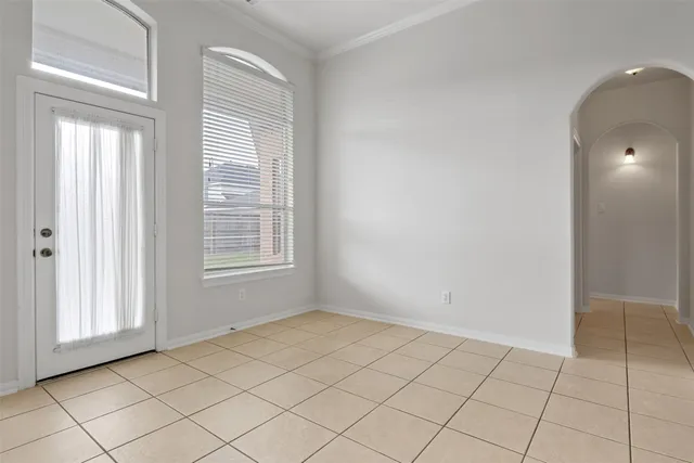 a view of an empty room and window