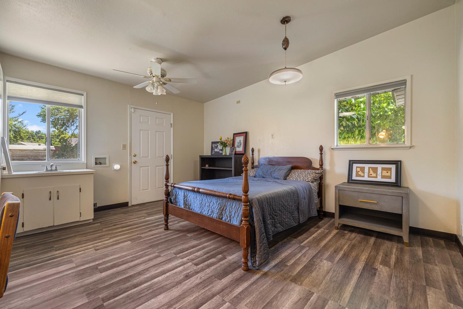 3824 Hubbard Road Stockton, CA 95215 - Photo 11 of 79 a spacious bedroom with a bed and a window