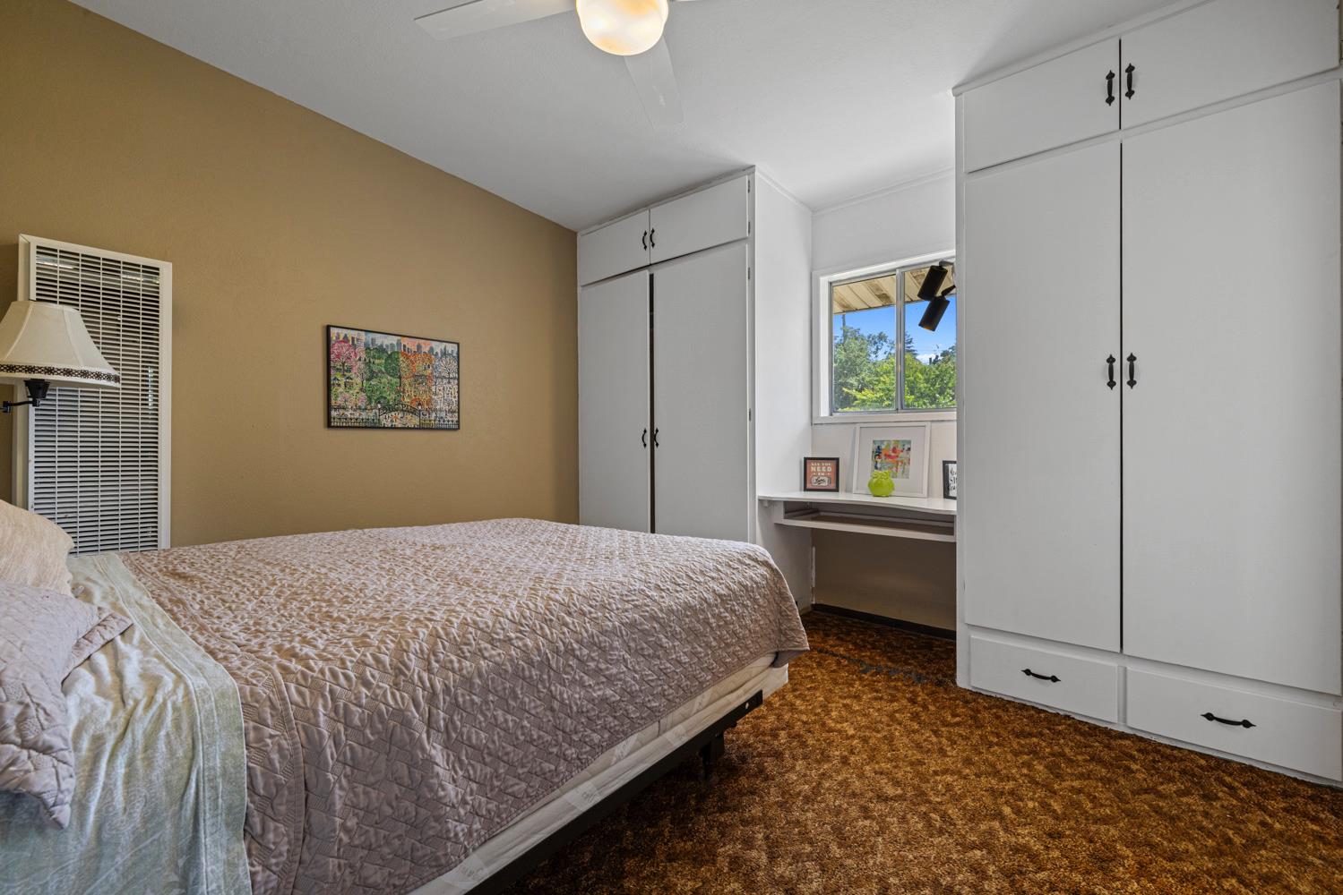 3824 Hubbard Road Stockton, CA 95215 - Photo 19 of 79 a bedroom with a bed and a window