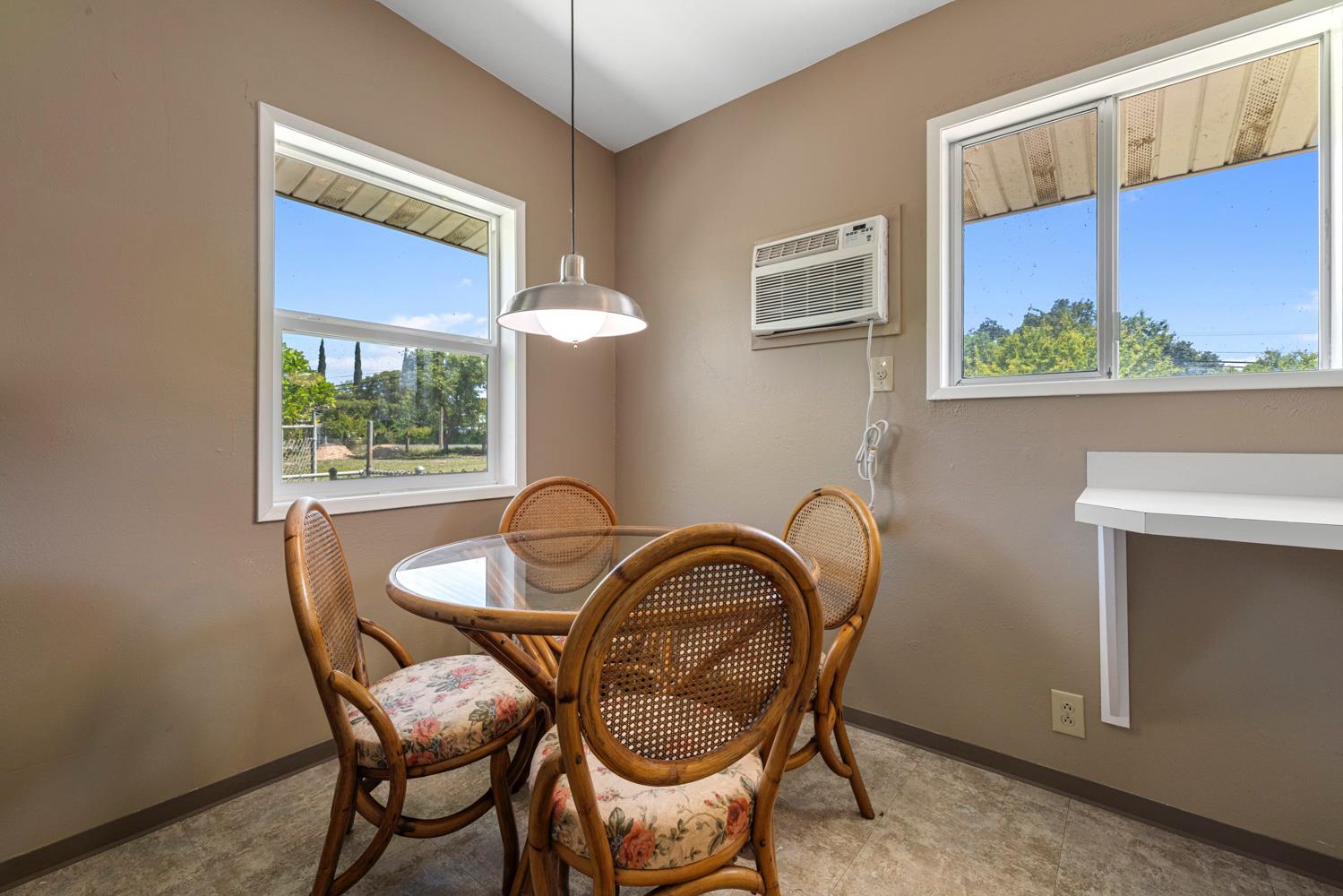 3824 Hubbard Road Stockton, CA 95215 - Photo 25 of 79 a dining room with furniture and window