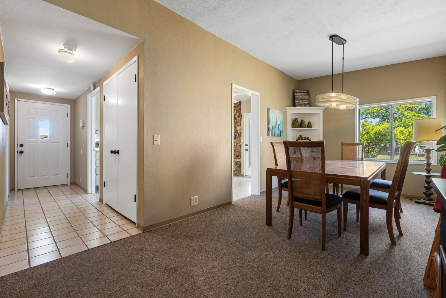 3824 Hubbard Road Stockton, CA 95215 - Photo 30 of 79 a dining room with furniture and window