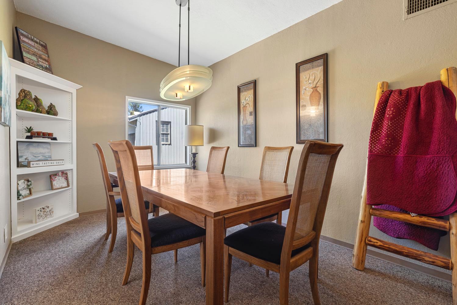 3824 Hubbard Road Stockton, CA 95215 - Photo 31 of 79 a view of a dining room with furniture