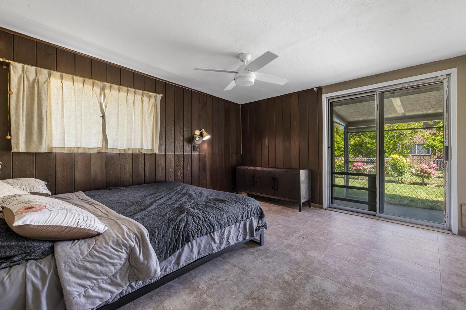 3824 Hubbard Road Stockton, CA 95215 - Photo 49 of 79 a bedroom with a bed and a large window