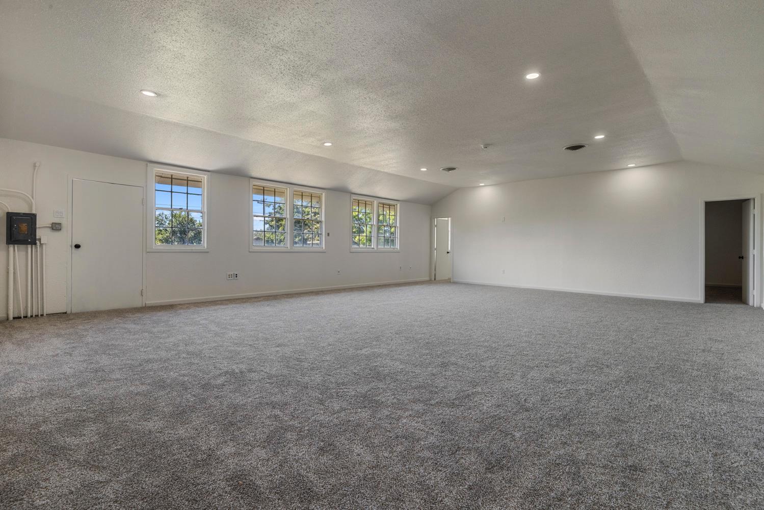 3824 Hubbard Road Stockton, CA 95215 - Photo 61 of 79 an empty room with a empty space and windows