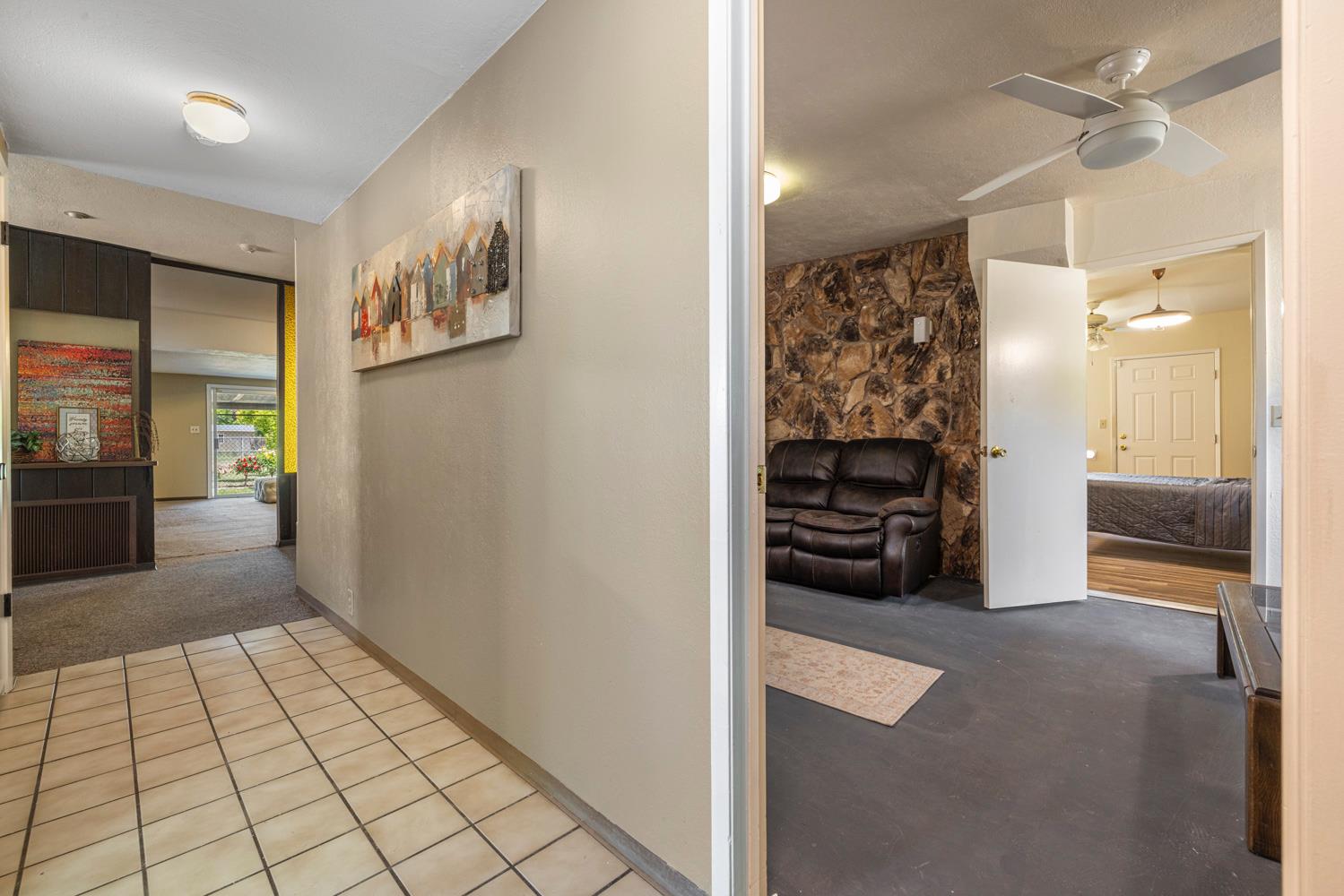 3824 Hubbard Road Stockton, CA 95215 - Photo 7 of 79 a view of a hallway view with living room