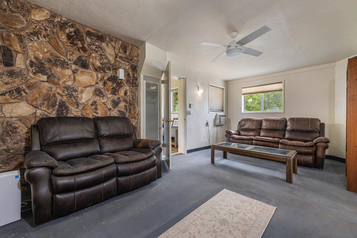3824 Hubbard Road Stockton, CA 95215 - Photo 8 of 79 a living room with furniture and a rug