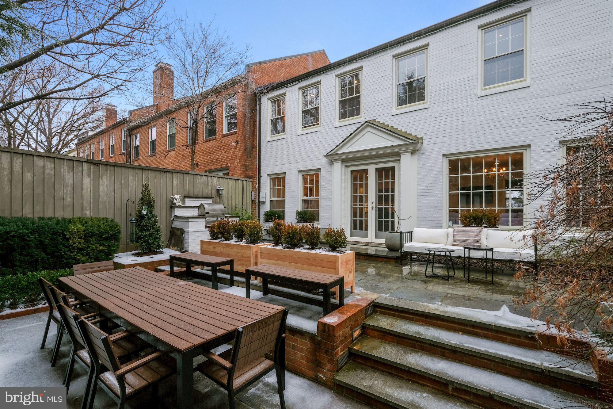 2810 R Street Northwest Washington, DC 20007 - Photo 11 of 30 Multi-level flagstone patio with grilling station