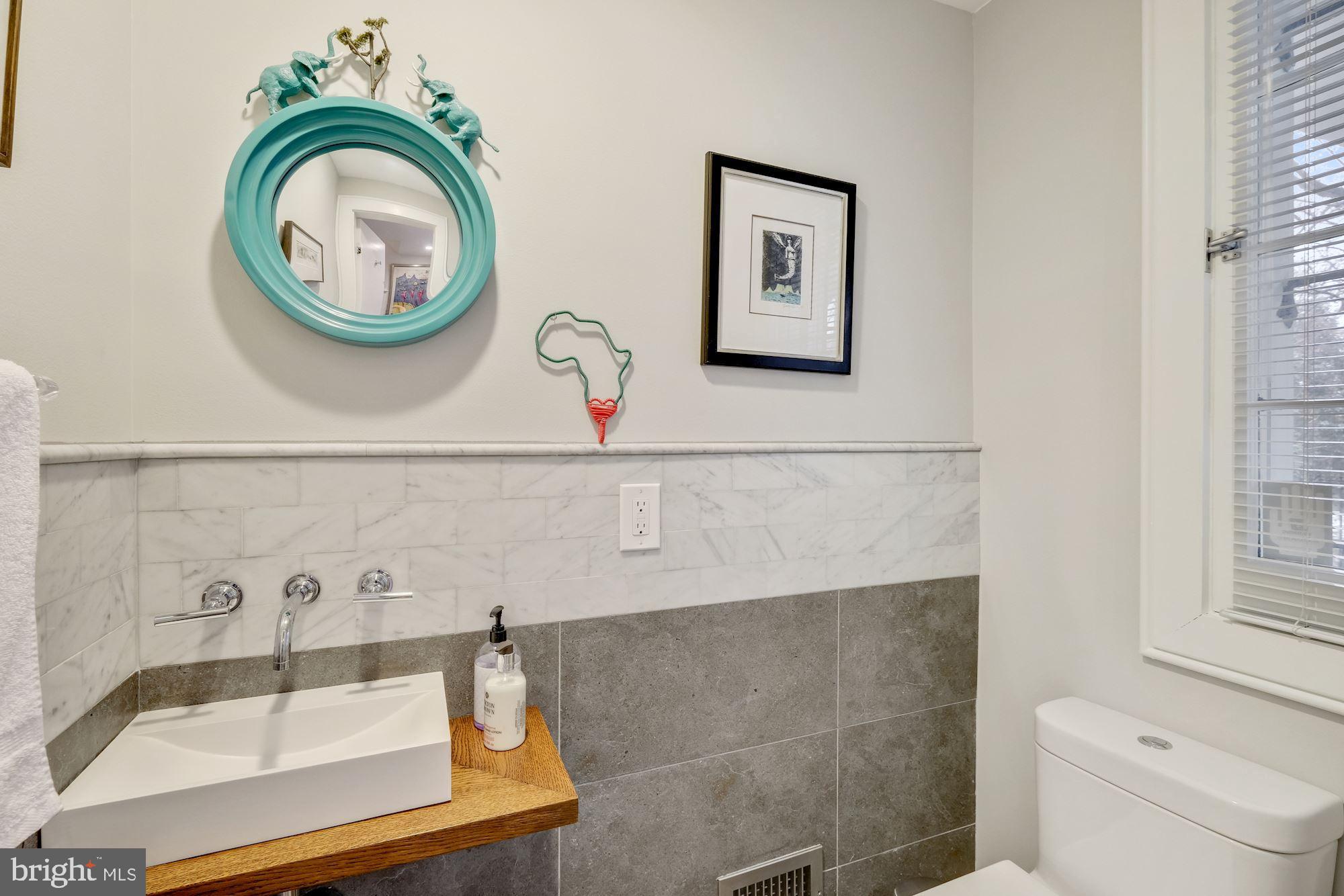 2810 R Street Northwest Washington, DC 20007 - Photo 14 of 30 Half bath off foyer on main level