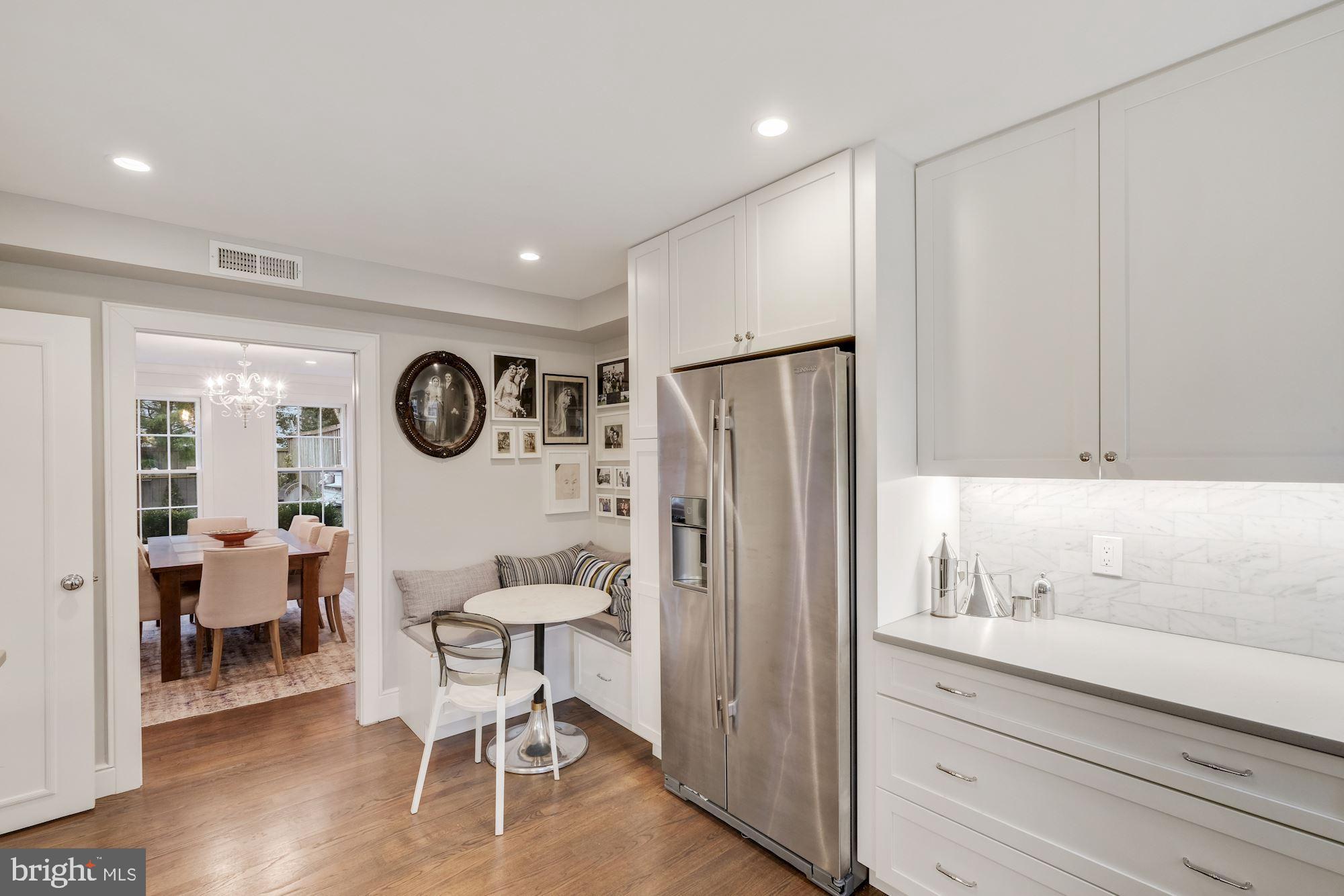 2810 R Street Northwest Washington, DC 20007 - Photo 9 of 30 Marble subway tile, hardwoods, recessed lights