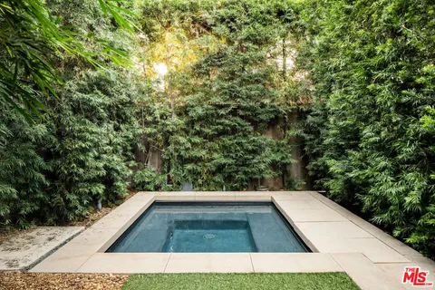 a view of backyard with green space