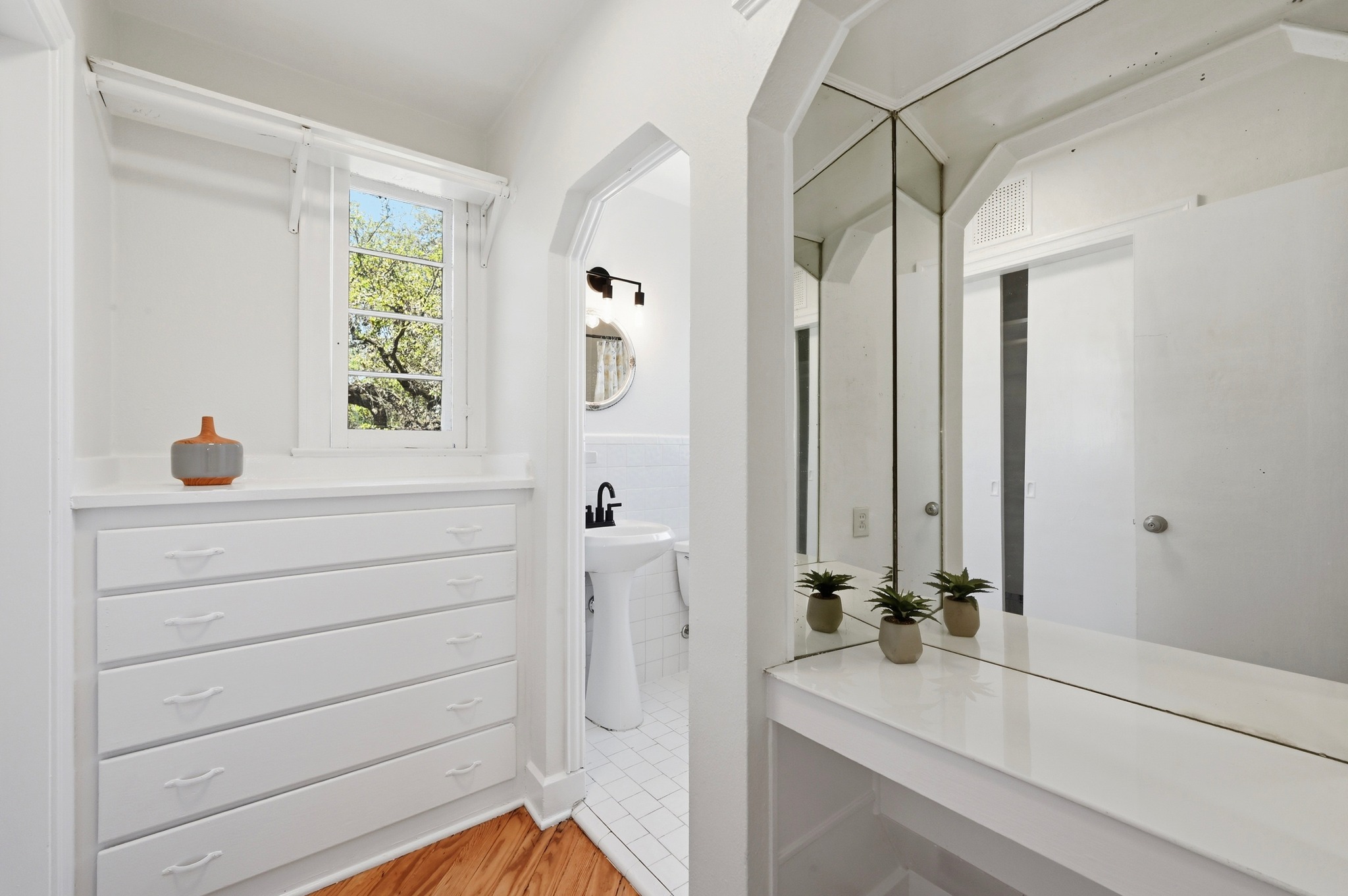 1403 Windsor Road, Unit A Austin, TX 78703 - Photo 9 of 18 a bathroom with a sink and a mirror