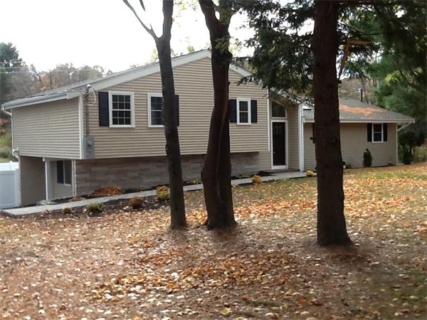 21 Meadowbrook Road Dover, MA 02030 - Photo 2 of 18 a house with trees in the background