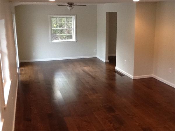 21 Meadowbrook Road Dover, MA 02030 - Photo 10 of 18 an empty room with wooden floor and windows