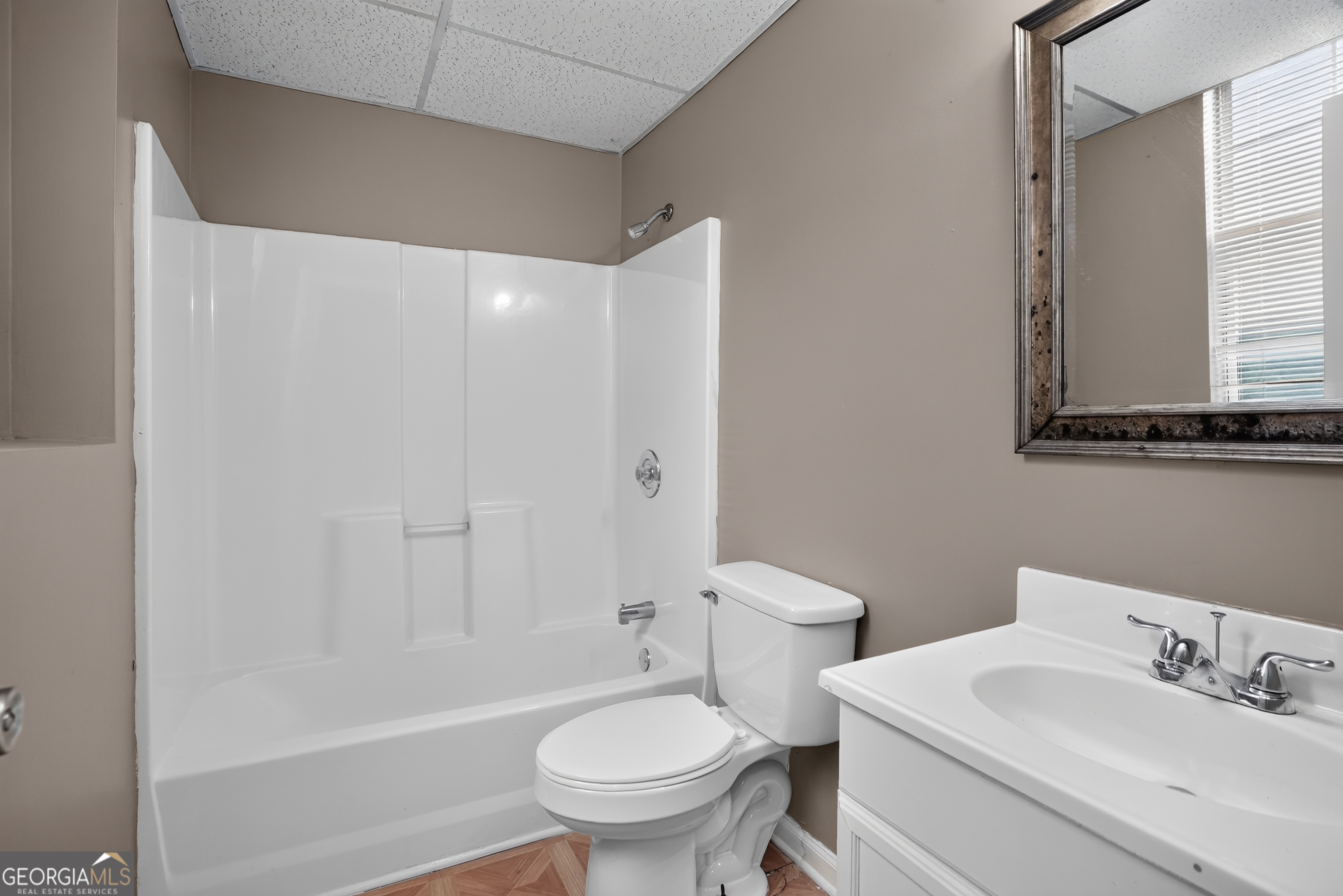 75 Linsley Way Covington, GA 30016 - Photo 37 of 48 a bathroom with a sink toilet and shower