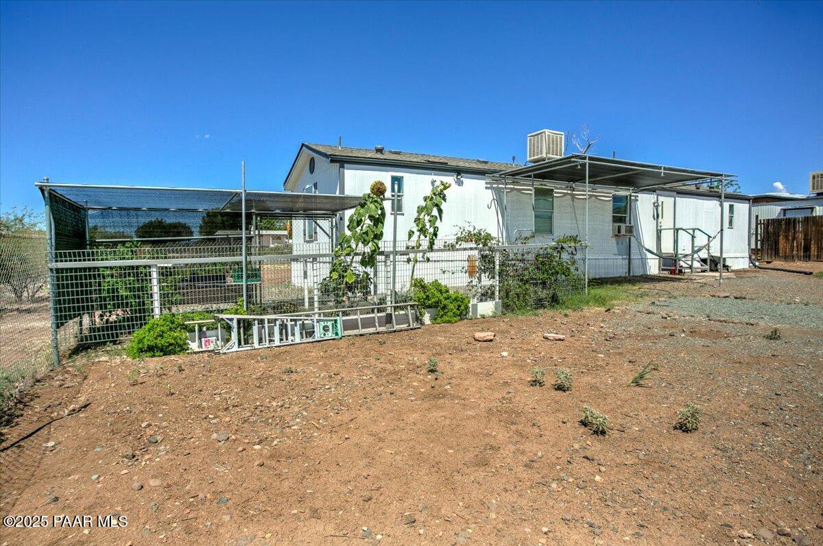15339 South Rolling Ridge Drive Mayer, AZ 86333 - Photo 17 of 20 a view of a house with a yard from a outdoor space
