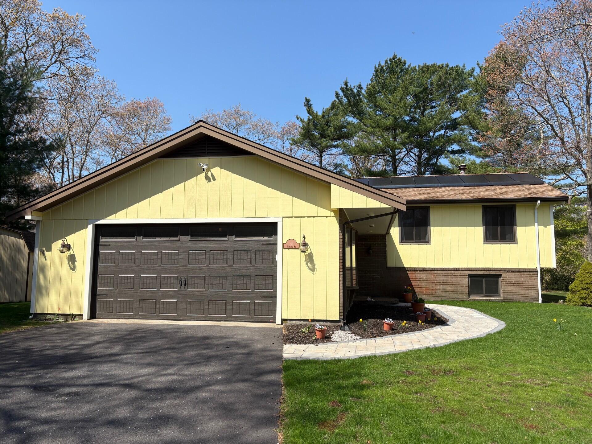 11 Michael Road Pocasset, MA 02559 - Photo 1 of 35 a view of a backyard with a small cabin