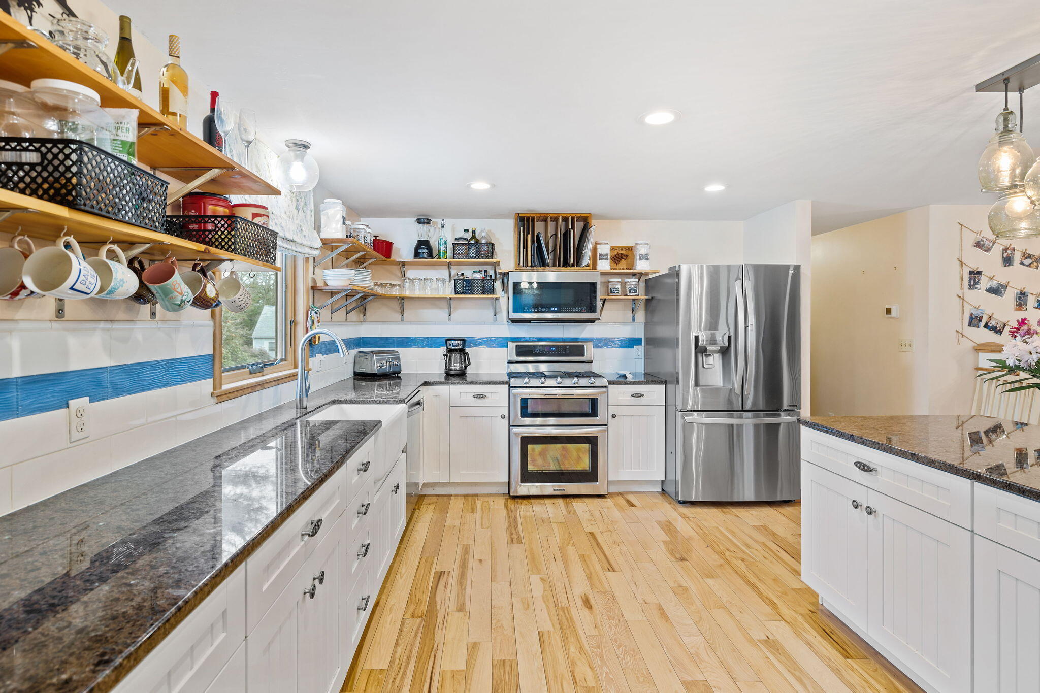 11 Michael Road Pocasset, MA 02559 - Photo 15 of 35 a kitchen with stainless steel appliances granite countertop a refrigerator and a stove top oven