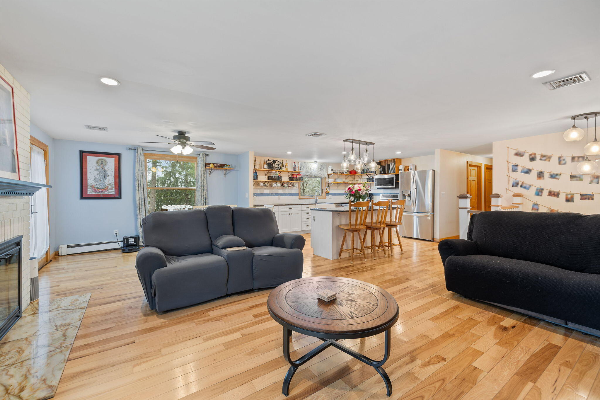 11 Michael Road Pocasset, MA 02559 - Photo 19 of 35 a living room with furniture and a wooden floor
