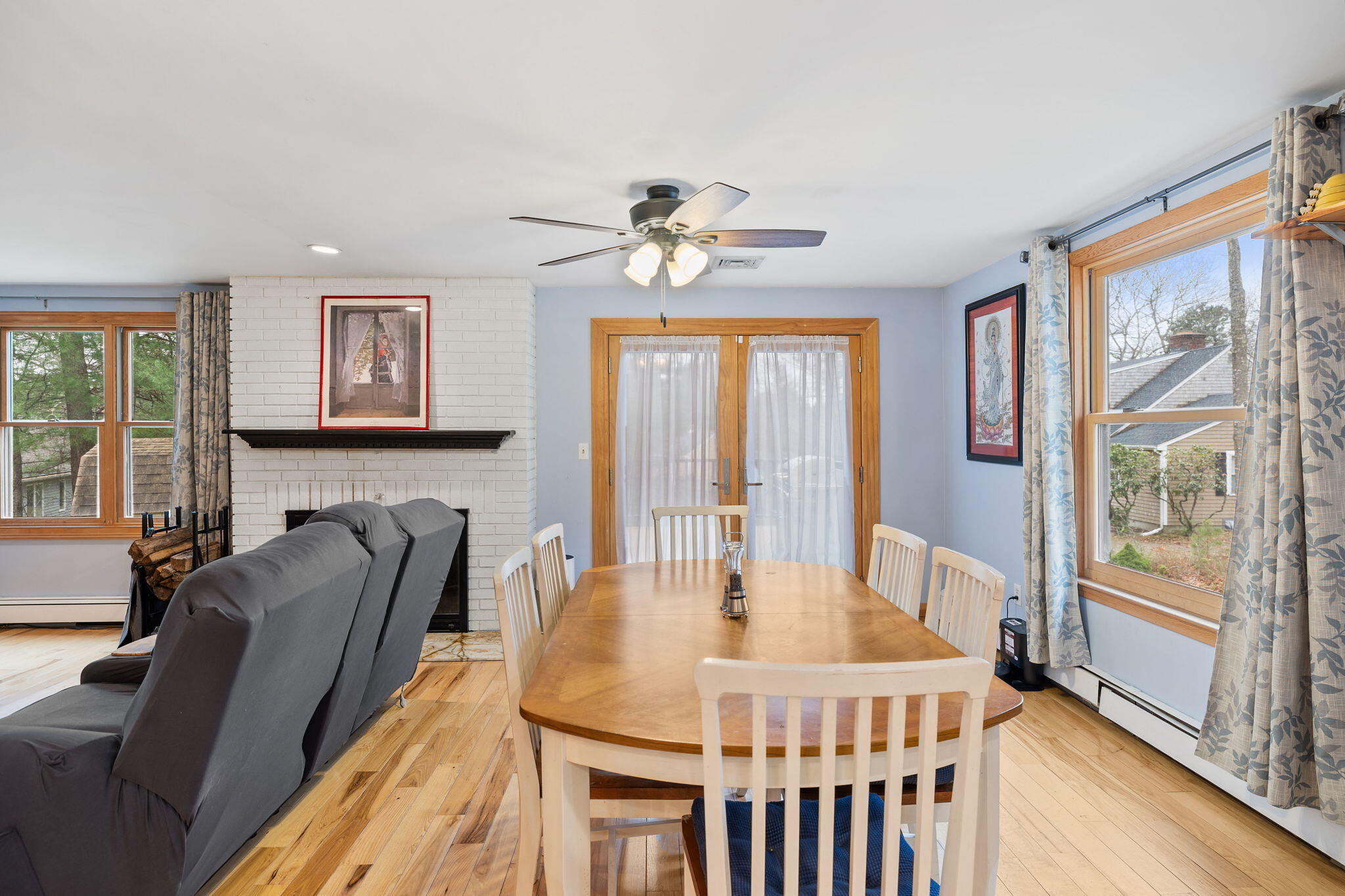 11 Michael Road Pocasset, MA 02559 - Photo 20 of 35 a dining room with furniture a window and wooden floor