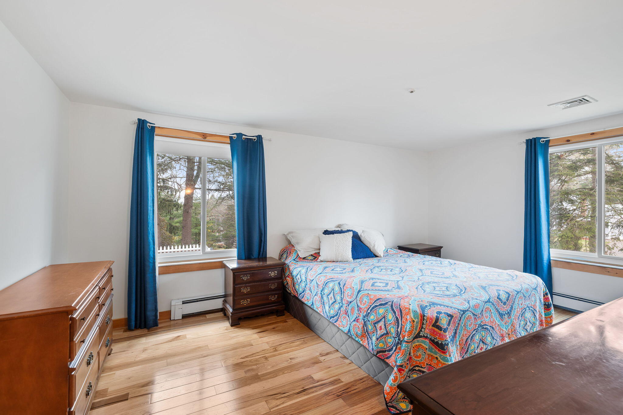 11 Michael Road Pocasset, MA 02559 - Photo 25 of 35 a bedroom with a bed and wooden floor