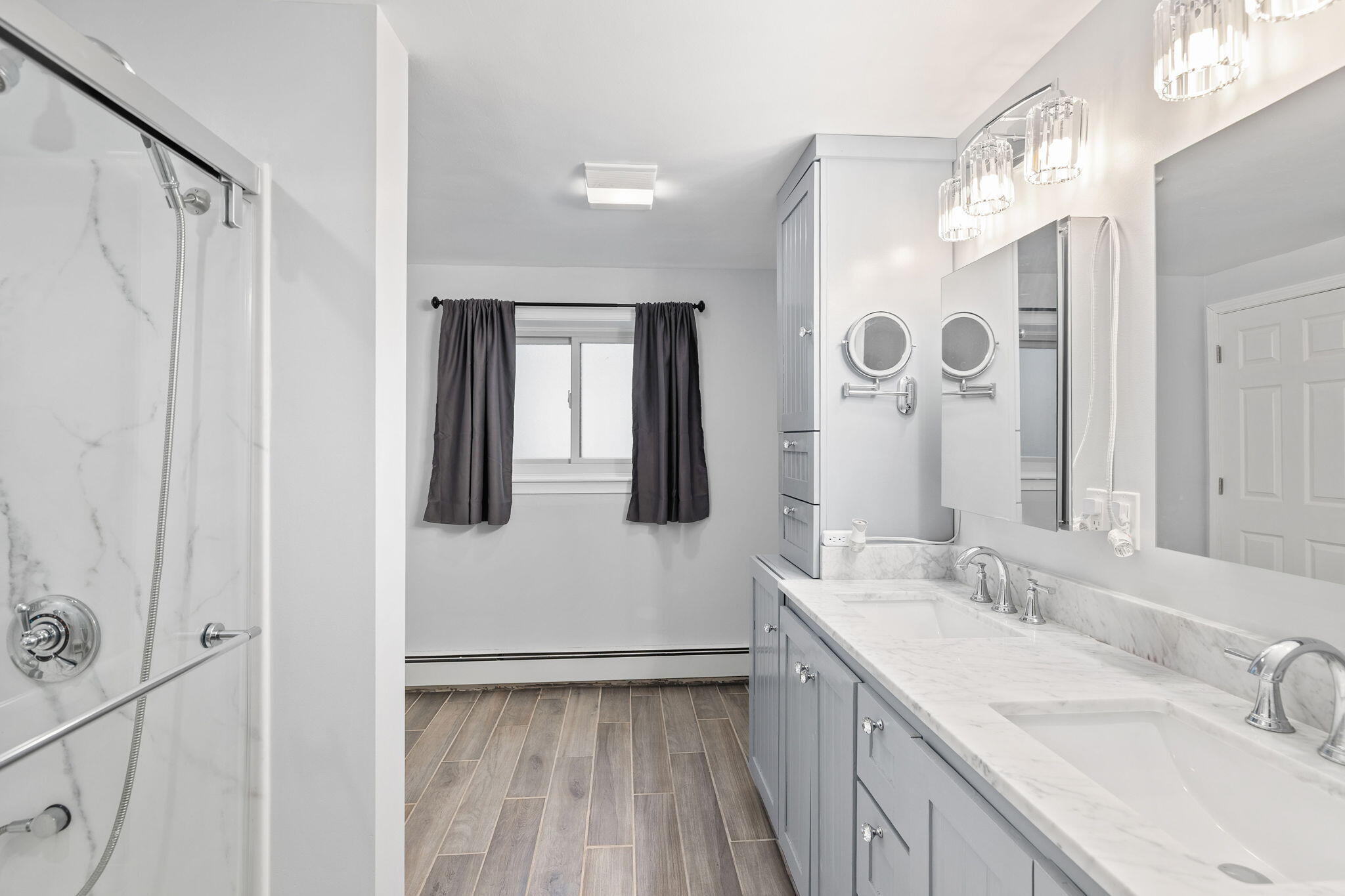 11 Michael Road Pocasset, MA 02559 - Photo 28 of 35 a bathroom with a double vanity sink mirror and shower