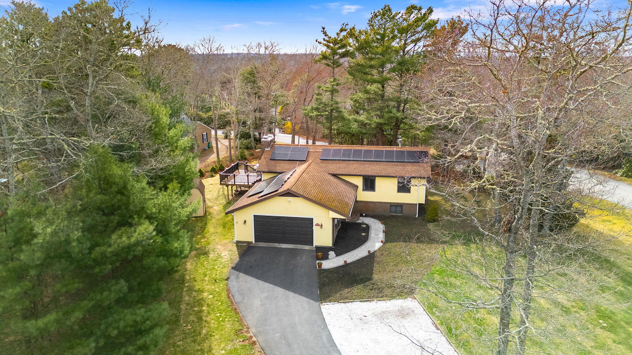 11 Michael Road Pocasset, MA 02559 - Photo 4 of 35 a front view of a house with a yard