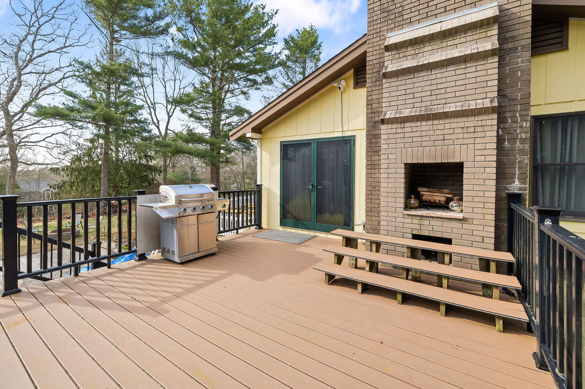 11 Michael Road Pocasset, MA 02559 - Photo 5 of 35 a view of a deck with wooden floor and fence