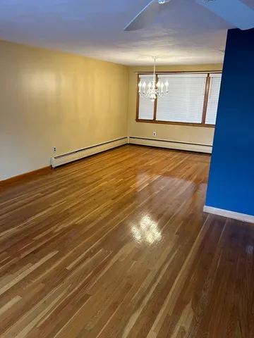 a view of an empty room with a sink