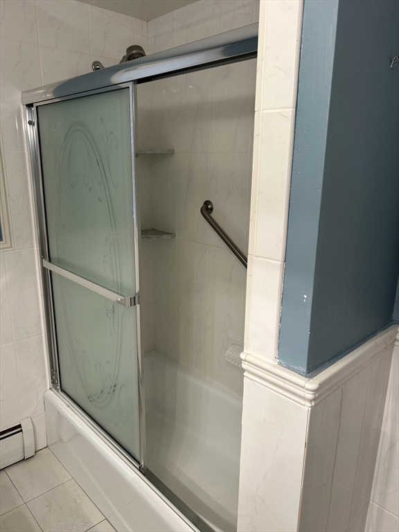 21 Athens Drive Saugus, MA 01906 - Photo 14 of 18 a bathroom with a glass shower door