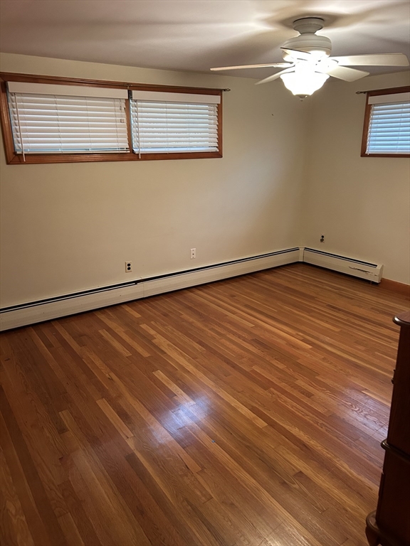 21 Athens Drive Saugus, MA 01906 - Photo 17 of 18 a view of empty room with wooden floor