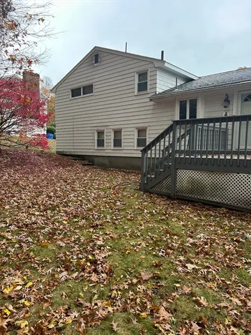 a backyard of a house with lots of green space