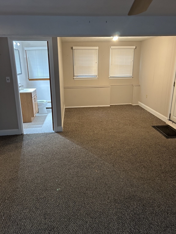 21 Athens Drive Saugus, MA 01906 - Photo 6 of 18 a view of a room with an empty space and a window