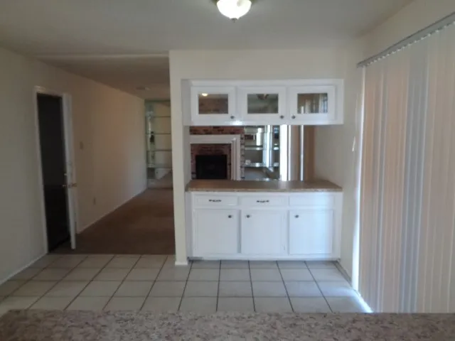 a kitchen with a sink a stove and refrigerator