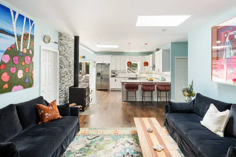 a living room with furniture and a couch