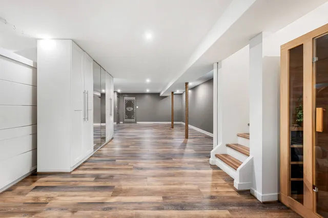 a view of a backyard with swimming pool