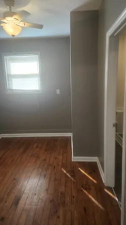 a room with two washing machine and sink