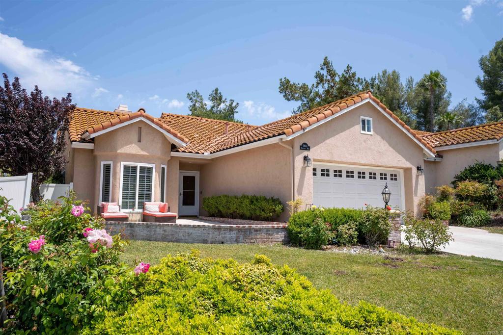 39668 Roripaugh Road Temecula, CA 92591 - Photo 1 of 1 a front view of a house with a yard