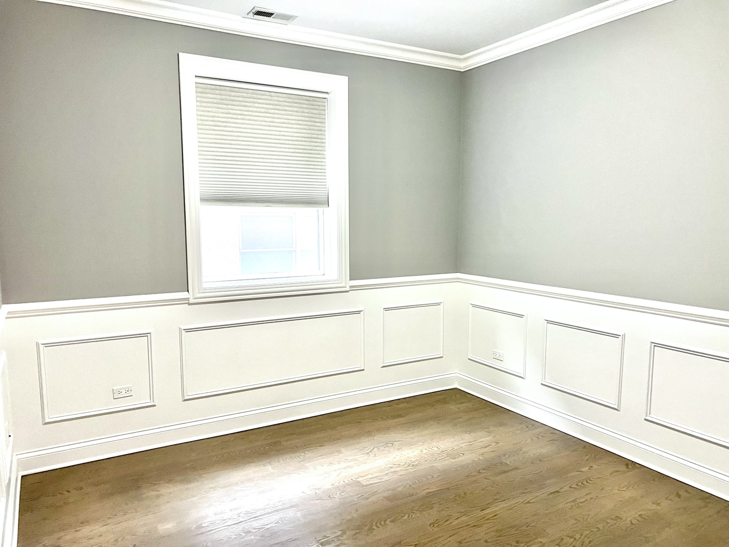 1503 West Thomas Street, Unit 2E Chicago, IL 60642 - Photo 9 of 12 a view of an empty room with wooden floor and cabinet
