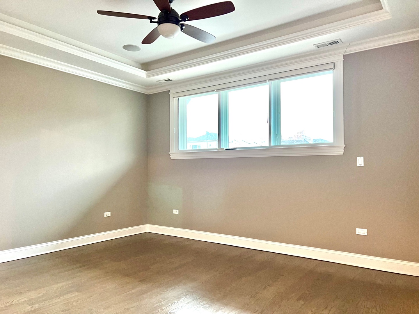 1503 West Thomas Street, Unit 2E Chicago, IL 60642 - Photo 10 of 12 a view of an empty room with a window