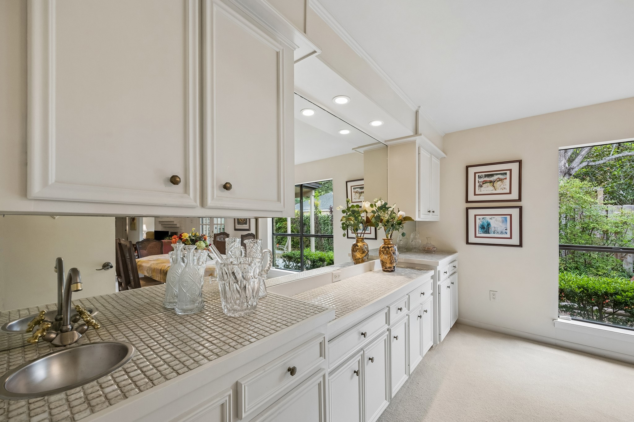 307 Oarman Court Houston, TX 77079 - Photo 17 of 38 a kitchen with counter top space and a sink
