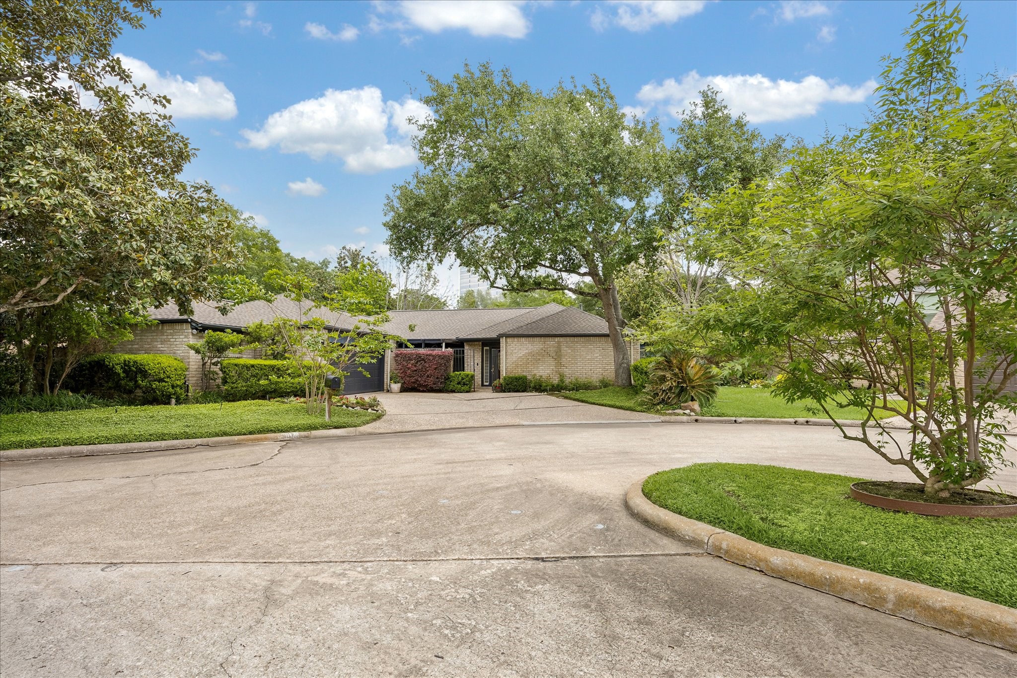 307 Oarman Court Houston, TX 77079 - Photo 3 of 38 a view of a house with a yard and large tree