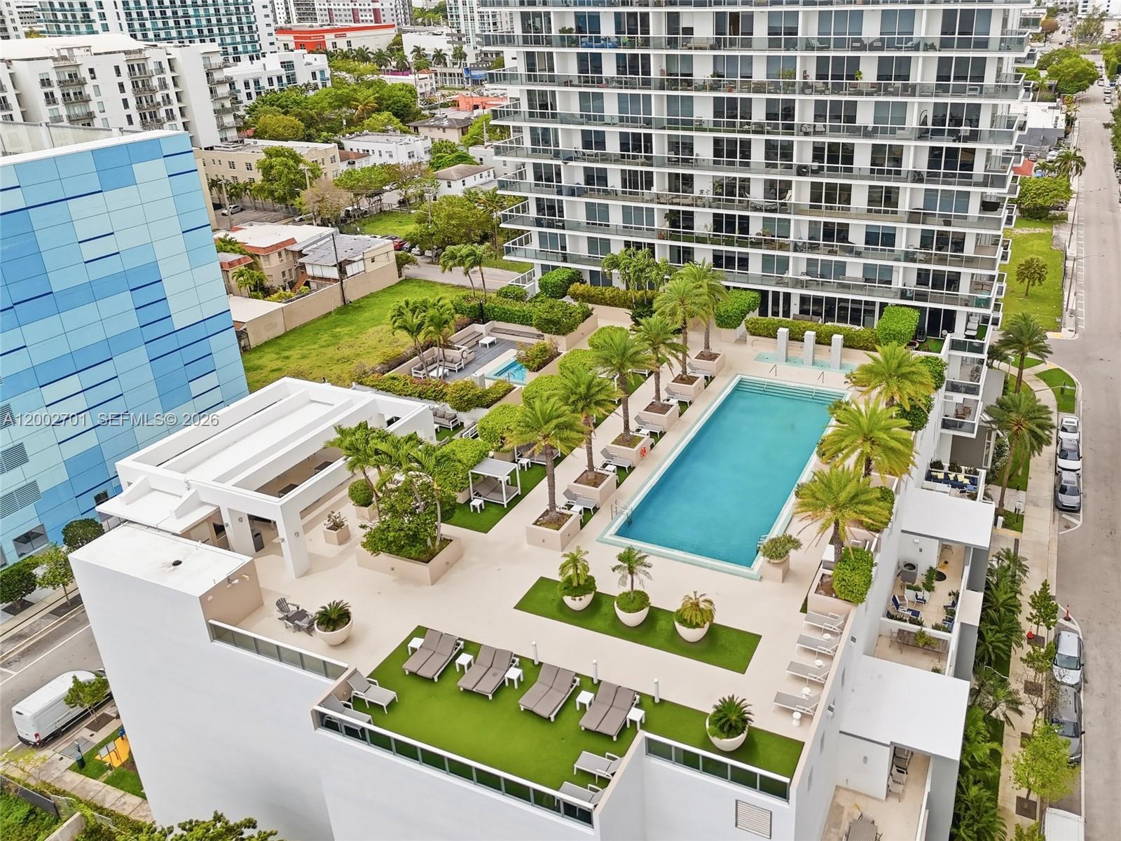 600 Northeast 27th Street, Unit 1002 Miami, FL 33137 - Photo 18 of 30 a view of swimming pool with outdoor seating