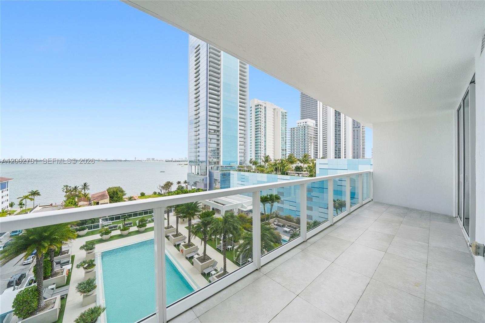 600 Northeast 27th Street, Unit 1002 Miami, FL 33137 - Photo 22 of 30 a dining room with furniture and window