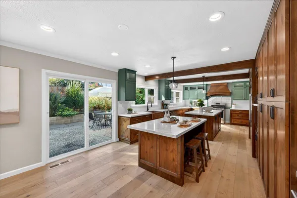 a bathroom with a sink vanity and a mirror