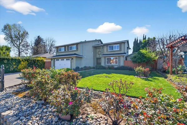 a front view of a house with a glass door