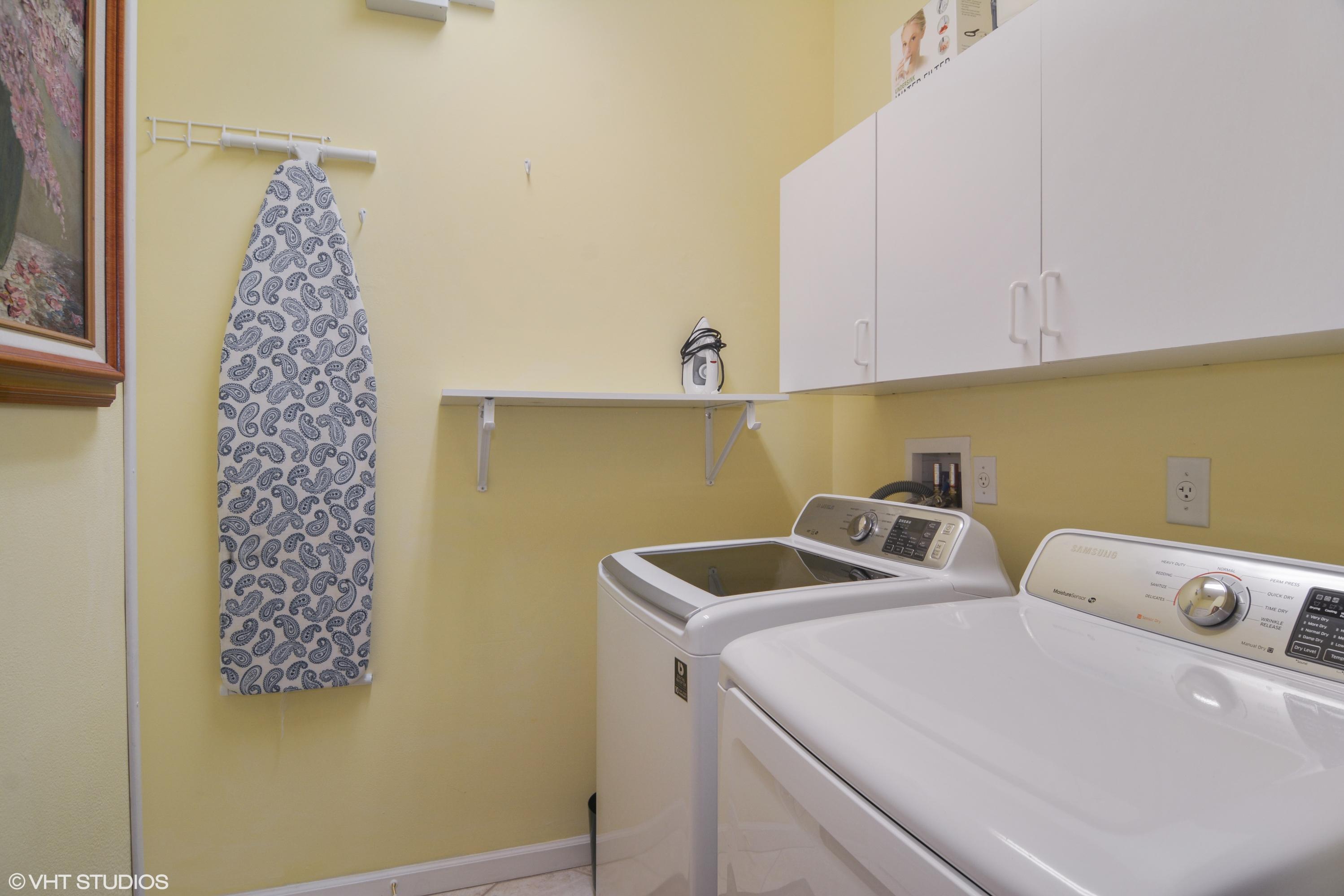 377 Springview Loop Port St. Lucie, FL 34986 - Photo 12 of 33 377 Springview laundry room