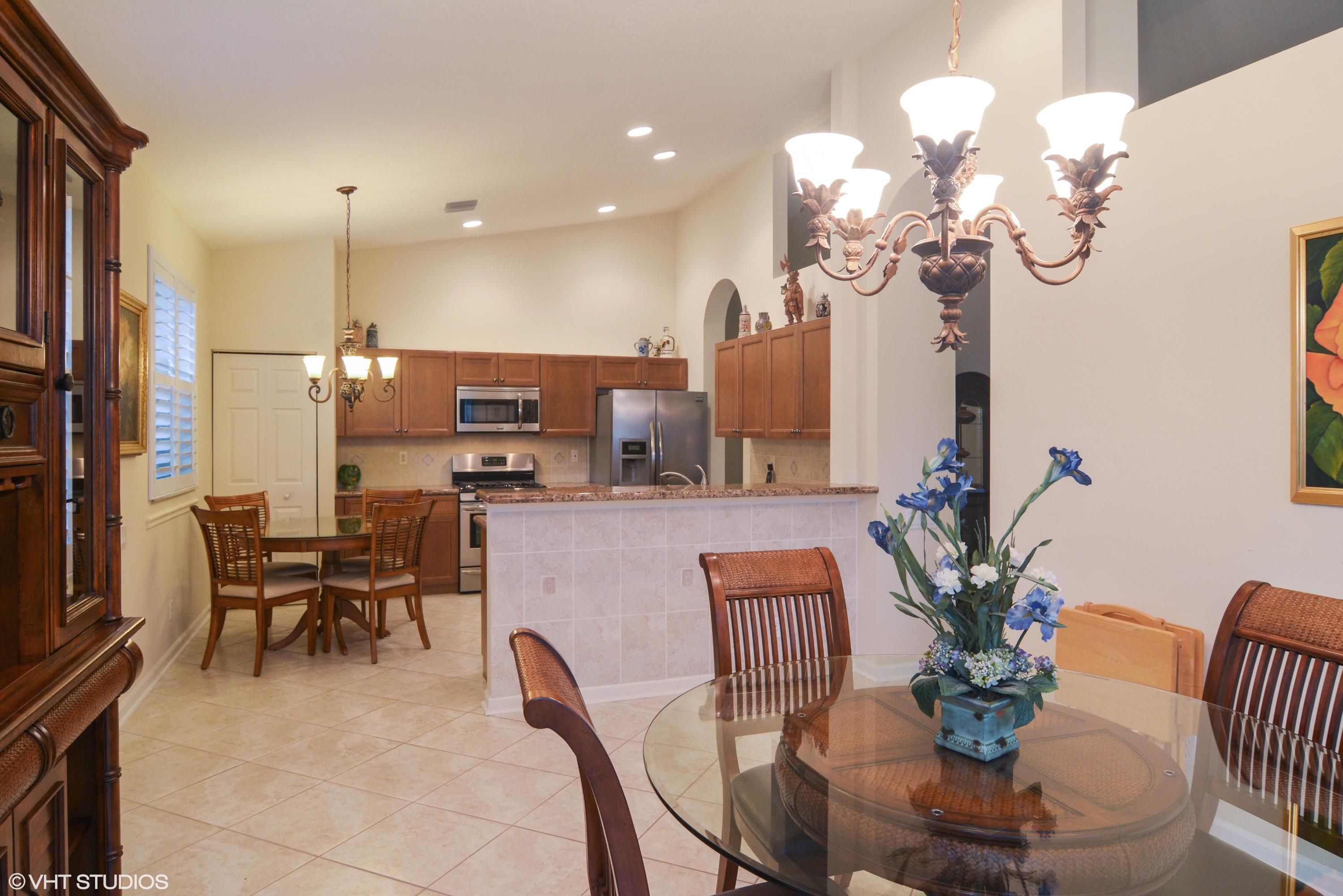 377 Springview Loop Port St. Lucie, FL 34986 - Photo 4 of 33 377 Springview dining room_kitchen